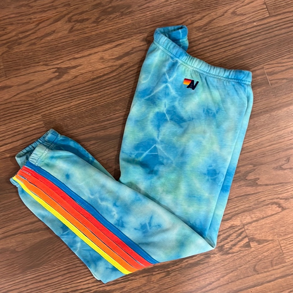 Aviator Nation turquoise tie dye sweatpants with neon stripes